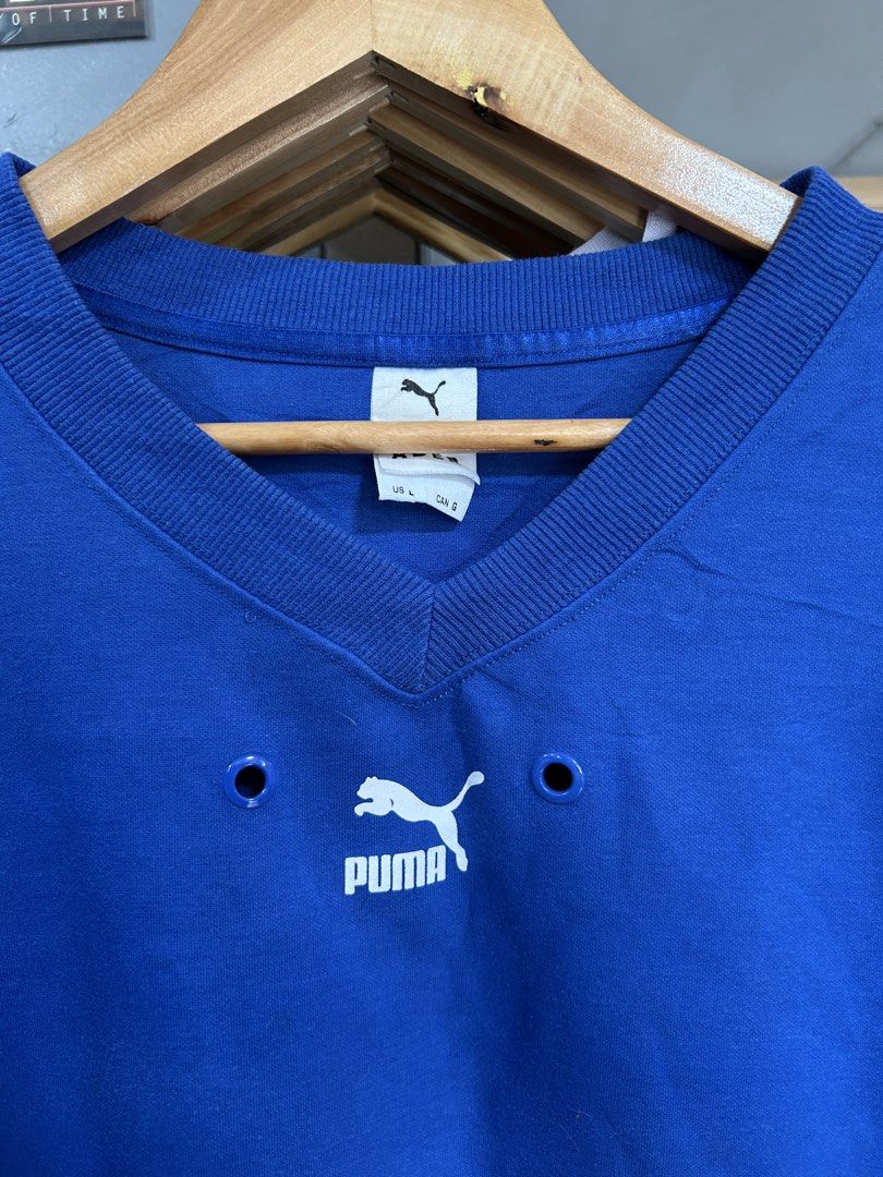 Puma Blue V-Neck Sweatshirt Size L (Category: Coats, Jackets and Outerwear) located in Davao. Submitted by ruggedthrift444 (Listing ID 1461561775, Image 3). Description: - Blue Puma sweatshirt - V-neck design with two eyelet details - Ribbed cuffs and hem - Ideal for casual wear - Size: L.