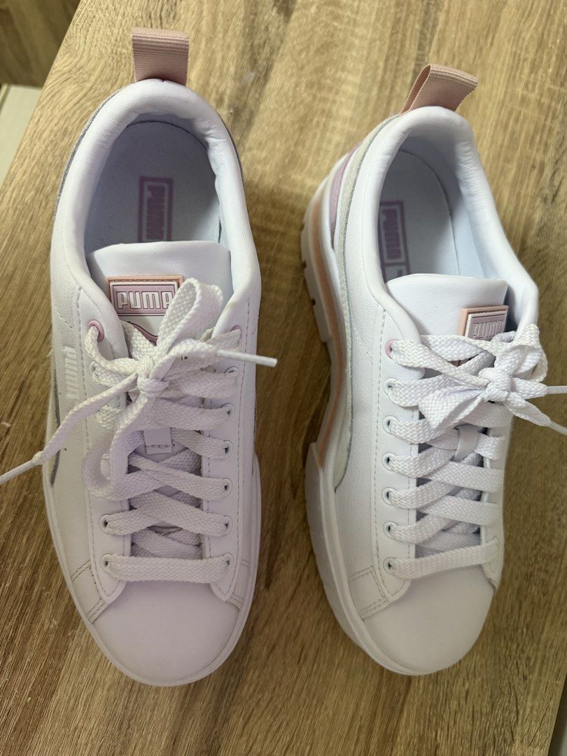 Puma White & Pink Platform Sneakers (Category: Sneakers) located in Pasig City. Submitted by jenrosesteller (Listing ID 1461501302, Image 2). Description: - White Puma sneakers - Pink and grey accents - Platform sole for added height - Lace-up closure - Heel pull tab for easy wear - Ideal for casual outfits - Size: 39 EUR / 6 UK / 8.5 US - No box, bought in HK (bought 3 pcs) impulsive buying due to discount :/ .