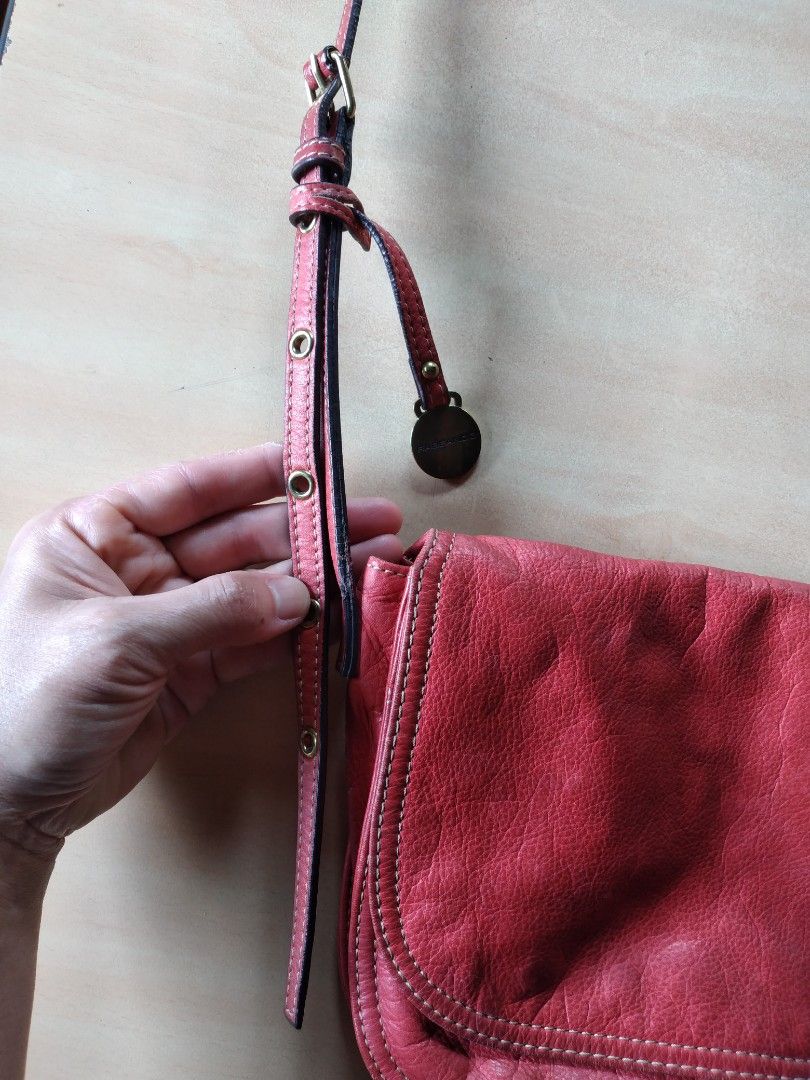 RABEANCO Genuine Leather Crossbody Shoulder Bag (Category: Cross-body Bags) located in Baguio. Submitted by tipiditis (Listing ID 1461391154, Image 3). Description: Price: 355 Location: Baguio Bag body dimensions: 11 x 7 x 3 inches Soft leather 3 bag partitions, 1 inner zipper pocket Flaw: leather surface flaws in last photo because of normal use - Genuine RABEANCO leather crossbody bag - Adjustable strap for comfortable wear - Interior zippered 