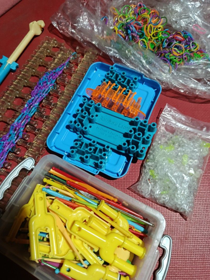 Rainbow Loom Bracelet Maker Kit with Bands and Tools (Category: Craft Supplies & Tools) located in Quezon City. Submitted by truephoenix.16cee3 (Listing ID 1461489236, Image 2). Description: - Complete Rainbow Loom set - Includes loom board, hooks, and colorful rubber bands - Extra clips and charms included - Great for creative fun and crafting - All pieces organized in containers.