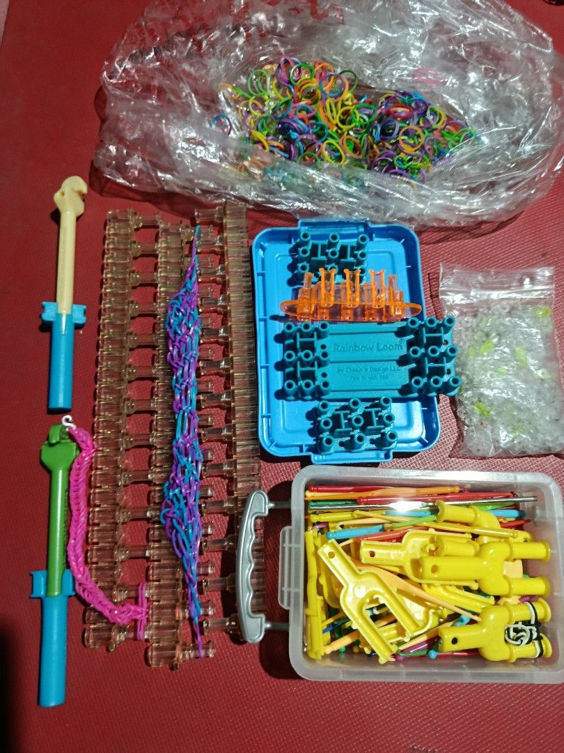 Rainbow Loom Bracelet Maker Kit with Bands and Tools (Category: Craft Supplies & Tools) located in Quezon City. Submitted by truephoenix.16cee3 (Listing ID 1461489236, Image 1). Description: - Complete Rainbow Loom set - Includes loom board, hooks, and colorful rubber bands - Extra clips and charms included - Great for creative fun and crafting - All pieces organized in containers.