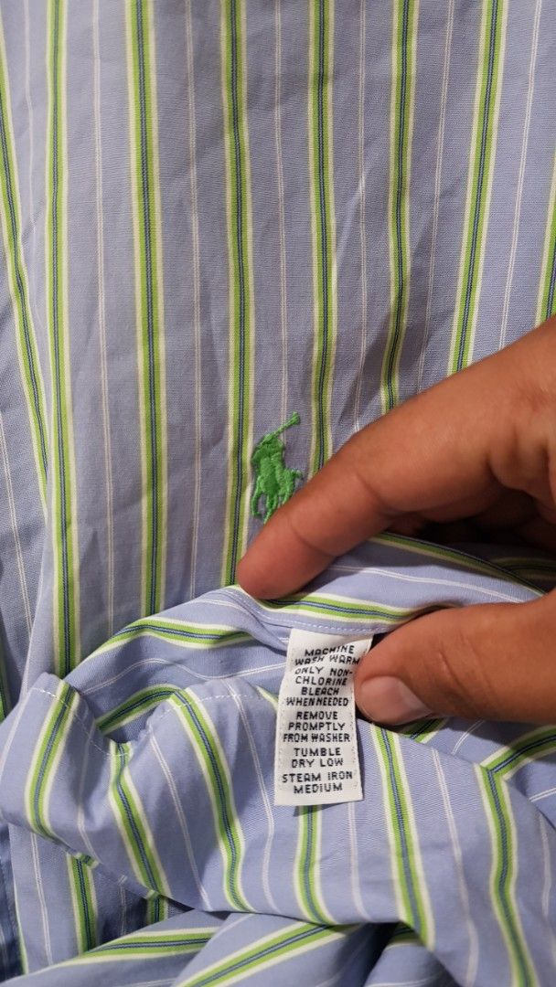 Ralph Lauren Classic Fit Striped Button-Down Shirt (Category: Tshirts & Polo Shirts ) located in Manila. Submitted by nice430 (Listing ID 1461459218, Image 3). Description: - Brand: Ralph Lauren - Style: Classic Fit Button-Down Shirt - Color: Blue and Green Stripes - Material: 100% Cotton - Features: Signature embroidered pony logo - Size: Medium - Occasion: Casual to Smart-Casual Wear.