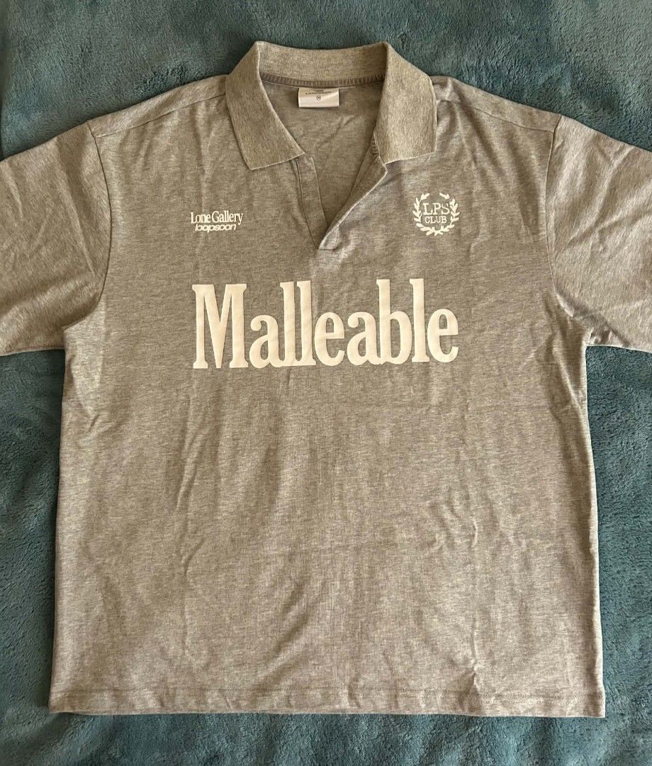 Random Oversized "Malleable" Polo Shirt🥶🥶 (Category: Tshirts & Polo Shirts ) located in Subic. Submitted by hnrblethrift7 (Listing ID 1461344420, Image 2). Description: Malleable:capable of being shaped, hammered, or pressed into a new form without breaking, or easily influenced and adapted by others. Size medium on tag kasya large 👌 W22.5L27.