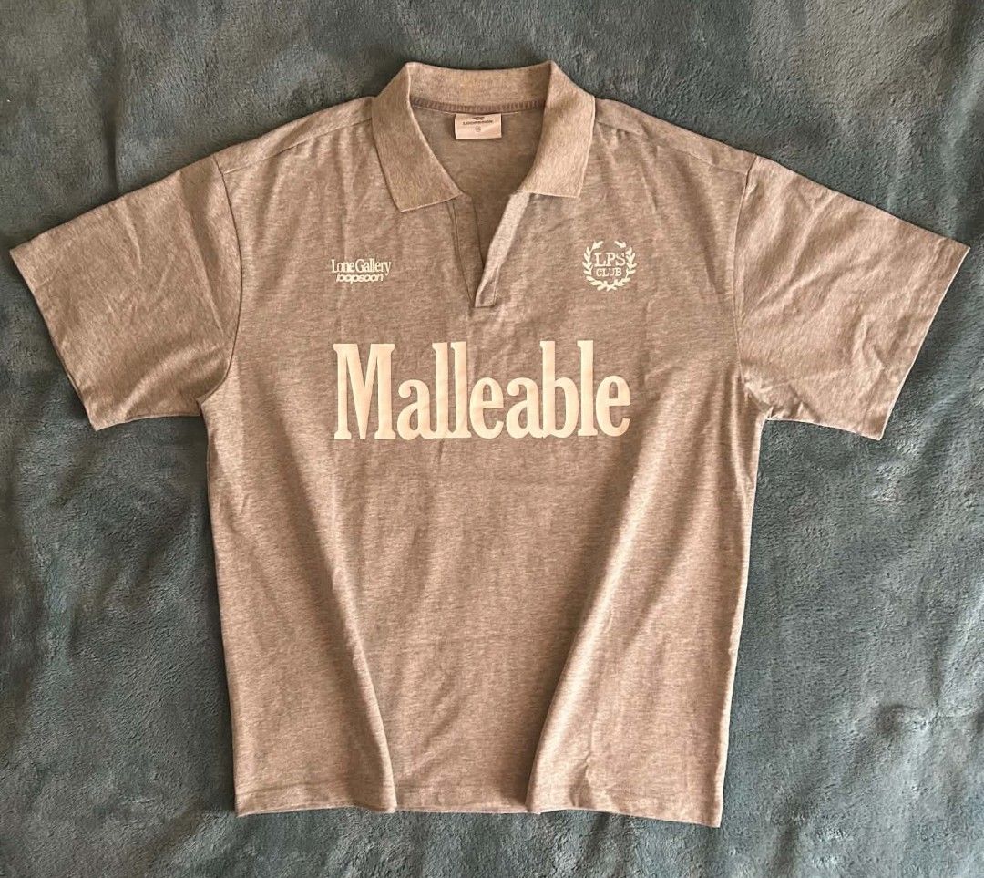 Random Oversized "Malleable" Polo Shirt🥶🥶 (Category: Tshirts & Polo Shirts ) located in Subic. Submitted by hnrblethrift7 (Listing ID 1461344420, Image 1). Description: Malleable:capable of being shaped, hammered, or pressed into a new form without breaking, or easily influenced and adapted by others. Size medium on tag kasya large 👌 W22.5L27.