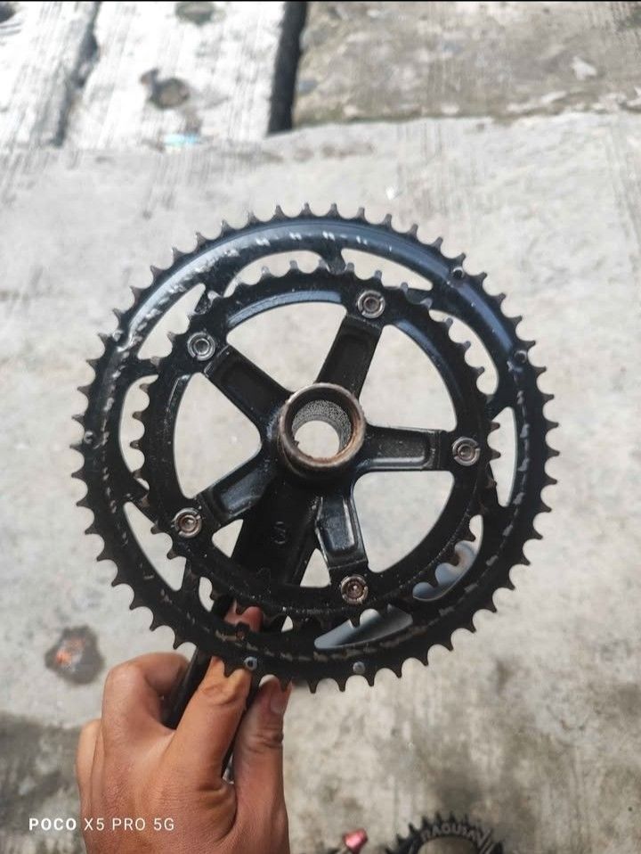 Rapido Bicycle Crankset with Chainrings (Category: Bicycles) located in Pasay City. Submitted by azimuthal (Listing ID 1461497823, Image 2). Description: - Rapido crankset - Black finish - Double chainring setup - Minor scuffs from normal use - Ready for installation - Selling as is.