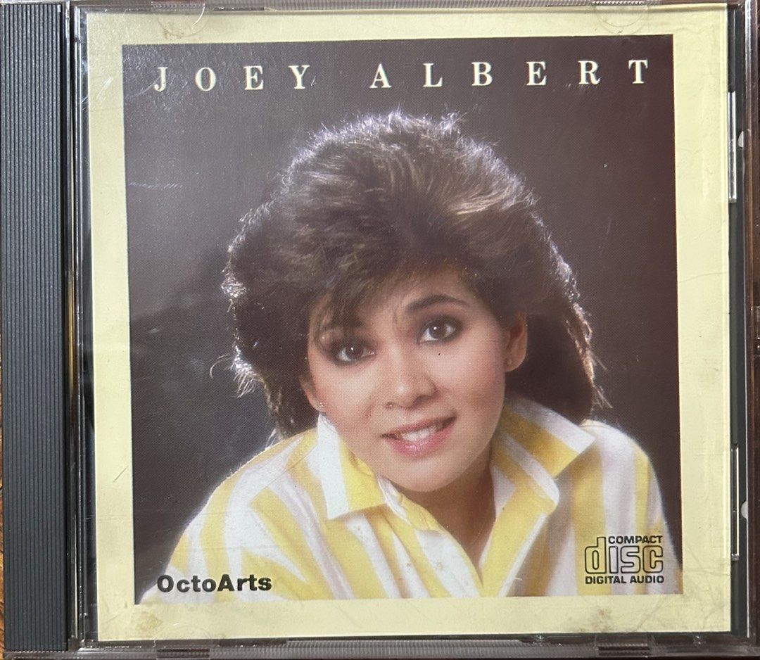 Rare Joey Albert OctoArts CD (Category: CDs & DVDs) located in Caloocan City. Submitted by dillydadi67 (Listing ID 1461471647, Image 1). Description: - Joey Albert's "Tell Me" CD - Label: OctoArts - Features hit songs: "Ikaw Lang Ang Mamahalin", "Larger Than Life" - Produced by Sunny R. Ilacad - Arranged by Louie Ocampo - Ideal for OPM music collectors - All tracks included as per back cover.