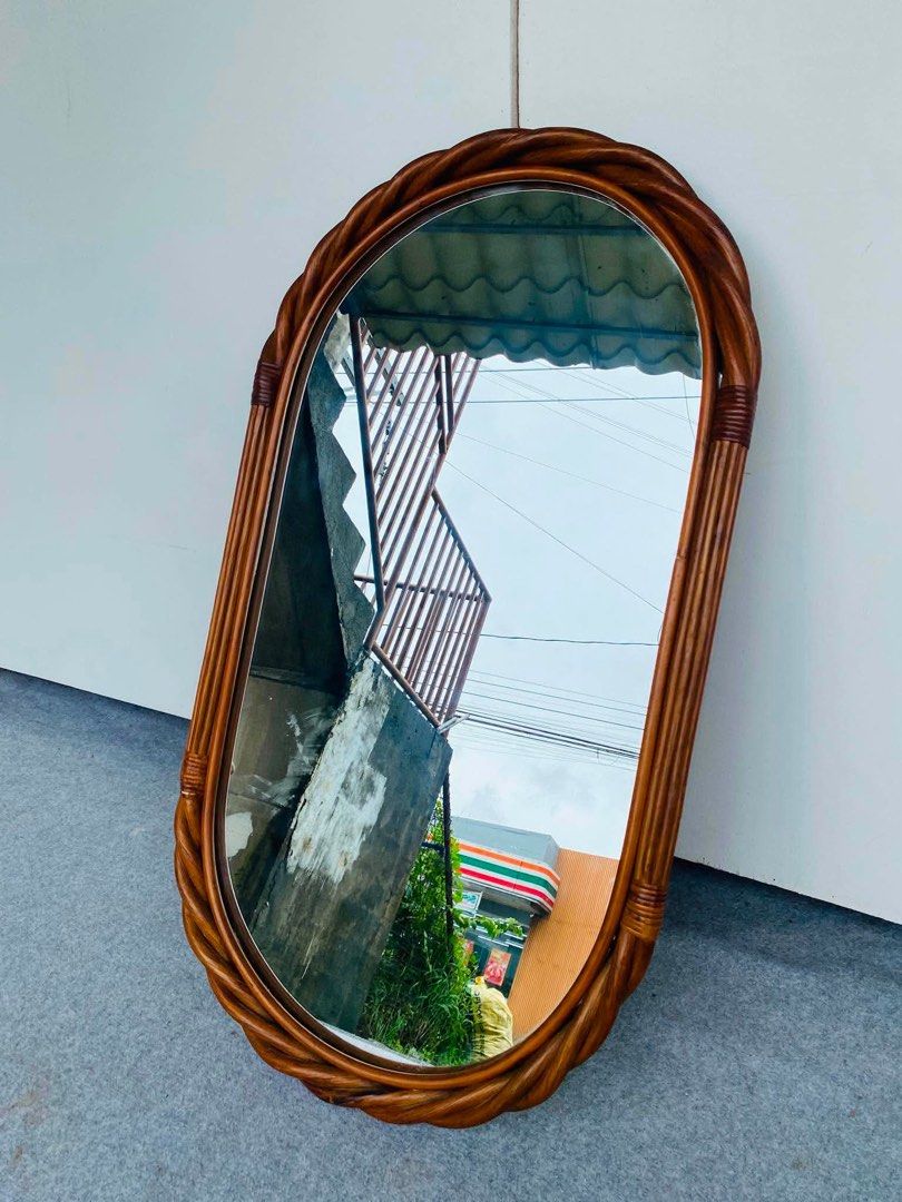 RATTAN WALL MIRROR (Category: Other Home Furniture) located in Manila. Submitted by jerichocal17856 (Listing ID 1461432059, Image 3). Description: “JAPAN SURPLUS” RATTAN WALL MIRROR SIZE: 20L” x 36H” inches (AS-IS ITEM) IN GOOD CONDITION.