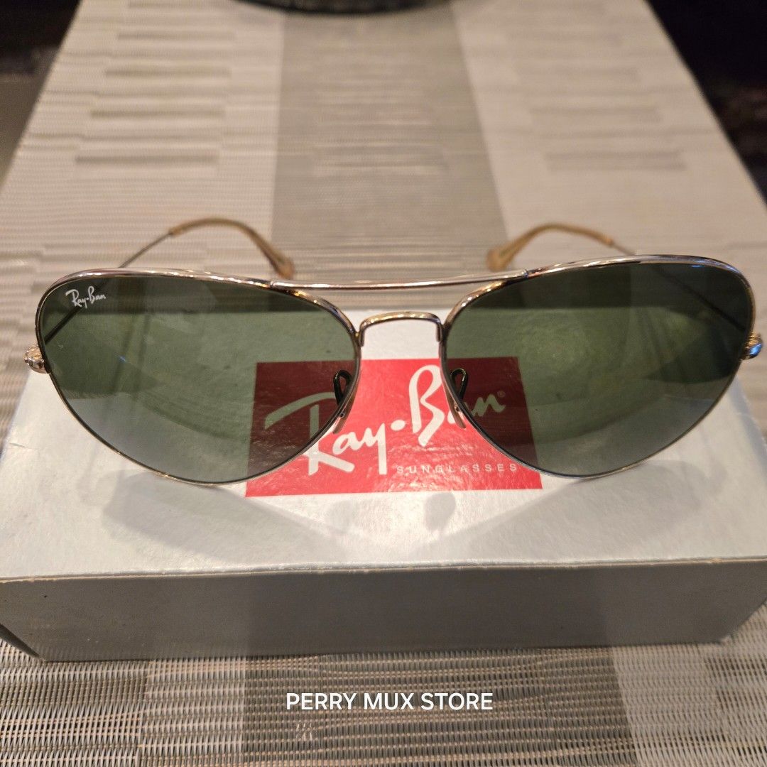 Ray-Ban Aviator Sunglasses with Original Box (Category: Sunglasses & Eyewear) located in Manila. Submitted by perrymux0185141 (Listing ID 1461417094, Image 3). Description: ✔️Original Ray-Ban AVIATOR CLASSIC Sunglasses ✔️Color Arista Gold and G-15 Green (58-14) - RB3025 ✔️Polarized eliminates glare increases clarity and enhances contrasts ✔️Size XL 58-14 ✔️Comes with original box, casing and manual ✔️Condition used ✔️Bought in sunglass haven, mar
