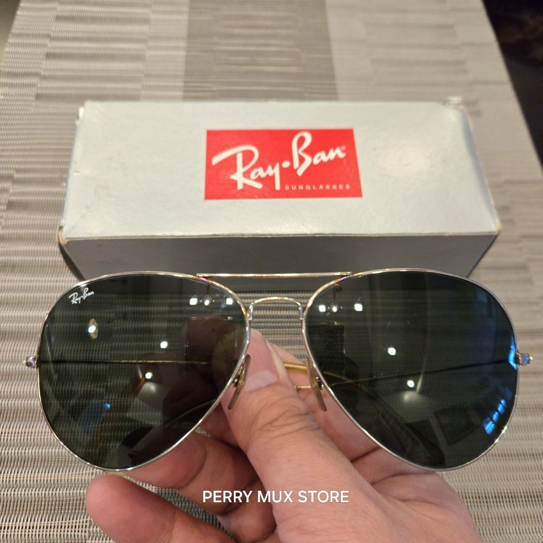 Ray-Ban Aviator Sunglasses with Original Box (Category: Sunglasses & Eyewear) located in Manila. Submitted by perrymux0185141 (Listing ID 1461417094, Image 1). Description: ✔️Original Ray-Ban AVIATOR CLASSIC Sunglasses ✔️Color Arista Gold and G-15 Green (58-14) - RB3025 ✔️Polarized eliminates glare increases clarity and enhances contrasts ✔️Size XL 58-14 ✔️Comes with original box, casing and manual ✔️Condition used ✔️Bought in sunglass haven, mar