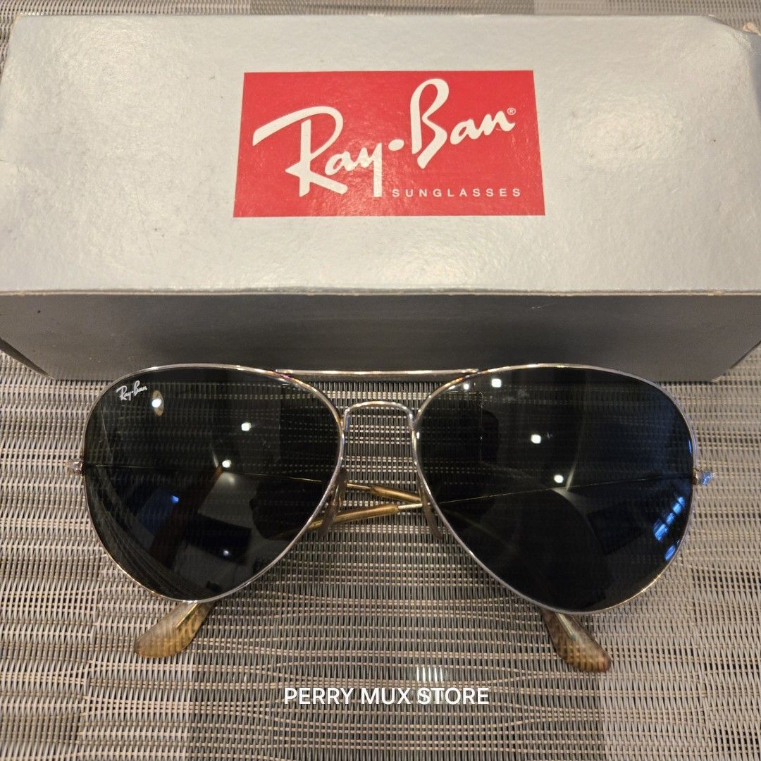 Ray-Ban Aviator Sunglasses with Original Box (Category: Sunglasses & Eyewear) located in Manila. Submitted by perrymux0185141 (Listing ID 1461417094, Image 2). Description: ✔️Original Ray-Ban AVIATOR CLASSIC Sunglasses ✔️Color Arista Gold and G-15 Green (58-14) - RB3025 ✔️Polarized eliminates glare increases clarity and enhances contrasts ✔️Size XL 58-14 ✔️Comes with original box, casing and manual ✔️Condition used ✔️Bought in sunglass haven, mar