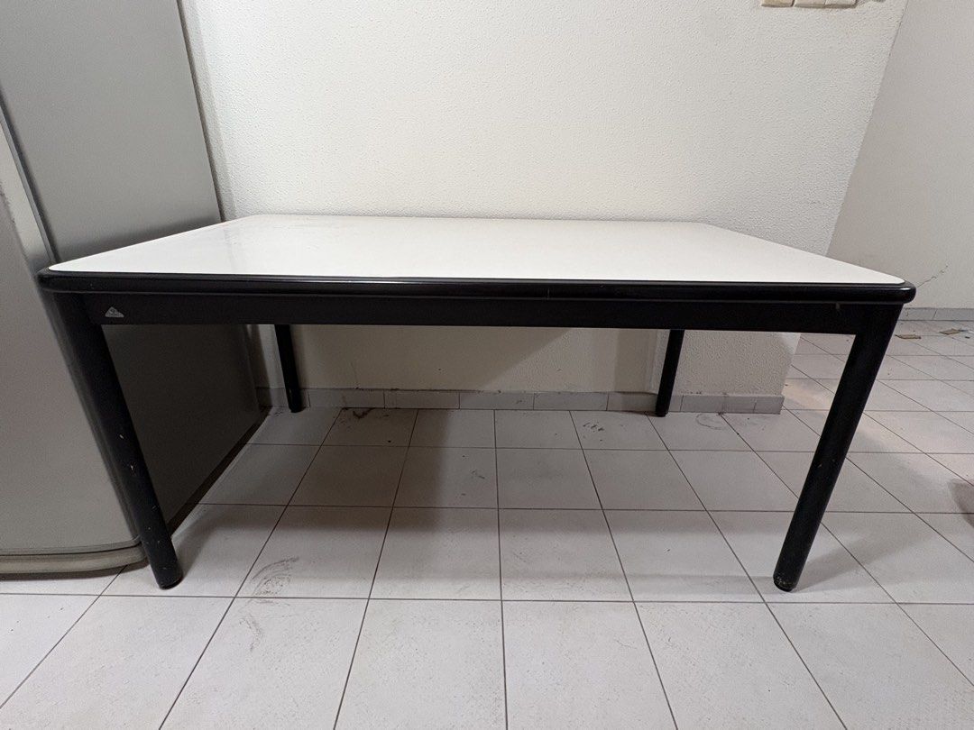 Rectangular Desk (Category: Tables & Sets) located in Singapore. Submitted by lizkoh02 (Listing ID 1461342600, Image 3). Description: - Sleek white tabletop with a sturdy black frame - Perfect size for a study or home office setup - Smooth, easy-to-clean surface - Stable and durable legs - Versatile design fits well in most room aesthetics - Made of a strong type of plastic, very easy to clean 154cm length 89cm width 75cm height.