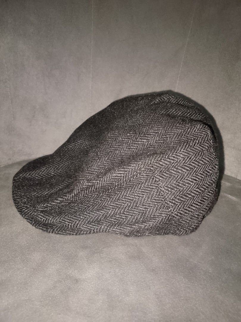 Classic Charcoal Herringbone Flat Cap (Category: Caps & Hats) located in Binangonan. Submitted by yuristalin888 (Listing ID 1461357124, Image 2). Description: Elevate your everyday wardrobe with this timeless charcoal flat cap, featuring a sophisticated herringbone pattern and a sleek, low-profile silhouette. Crafted from a structured, textured fabric with a sewn-down brim, it blends heritage charm with modern versatility. Whether you are dressin