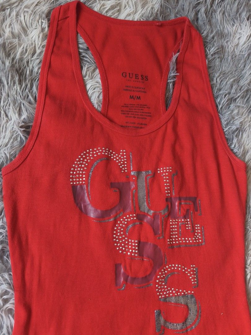 Red Guess Tank Top with Rhinestone (Category: Sleeveless) located in General Trias. Submitted by shanicemau09687 (Listing ID 1461450333, Image 3). Description: Xs-M (bust: 28-36in, length: 25in).