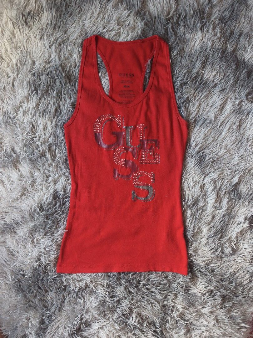 Red Guess Tank Top with Rhinestone (Category: Sleeveless) located in General Trias. Submitted by shanicemau09687 (Listing ID 1461450333, Image 1). Description: Xs-M (bust: 28-36in, length: 25in).
