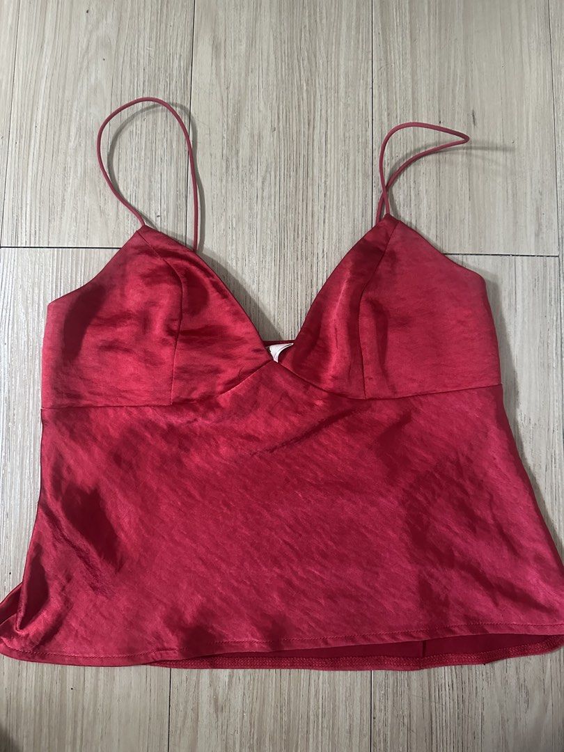 Red Satin Cami Top with Spaghetti Straps (Category: Sleeveless) located in Bacolod City. Submitted by kristellelopez (Listing ID 1461355783, Image 1). Description: - Cute red satin cami top - Features a V-neckline - Thin spaghetti straps - Subtle sheen and texture - Perfect for layering or wearing on its own - Pairs well with jeans or skirts - Easy to dress up or down.