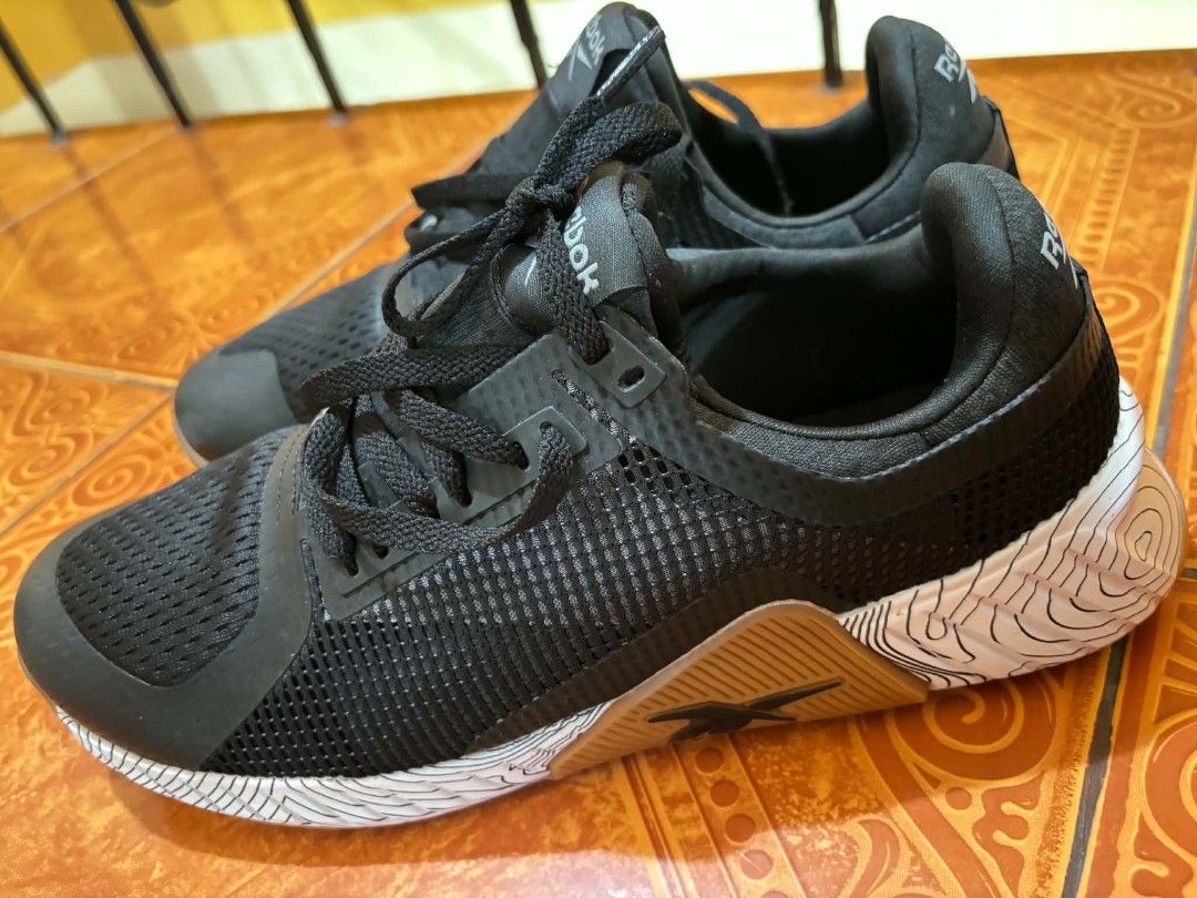 Reebok Black Training Shoes (Category: Sneakers) located in Manila. Submitted by llaisaaa (Listing ID 1461441838, Image 1). Description: - Black Reebok training shoes - Breathable mesh upper - Secure lace-up closure - Ideal for gym workouts or running .