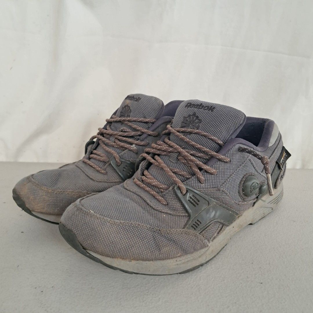 Reebok Pump Plus Cordura Grey Sneakers (Category: Sneakers) located in Bulacan. Submitted by amarijapansurplus (Listing ID 1461430347, Image 2). Description: Grey Reebok sneakers. Features Cordura fabric. Laces are grey with pink flecks. Some dirt marks on the soles and uppers. Tread on the soles still looks good. Pump mechanism on the side. Ready for your next adventure..