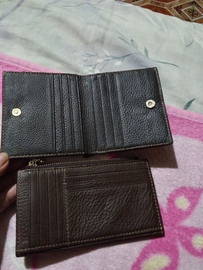 Rivera Leather Wallet and Card Holder Set (Category: Luxury Bags & Wallets) located in Manila. Submitted by aradoanita90032 (Listing ID 1461439130, Image 2). Description: - Set of 2 premium brown leather wallets - Includes a bifold wallet with secure snap closure - Also includes a slim zippered card holder with multiple slots - Both feature stylish stitching details - Ideal for keeping your cash and cards neatly organized.