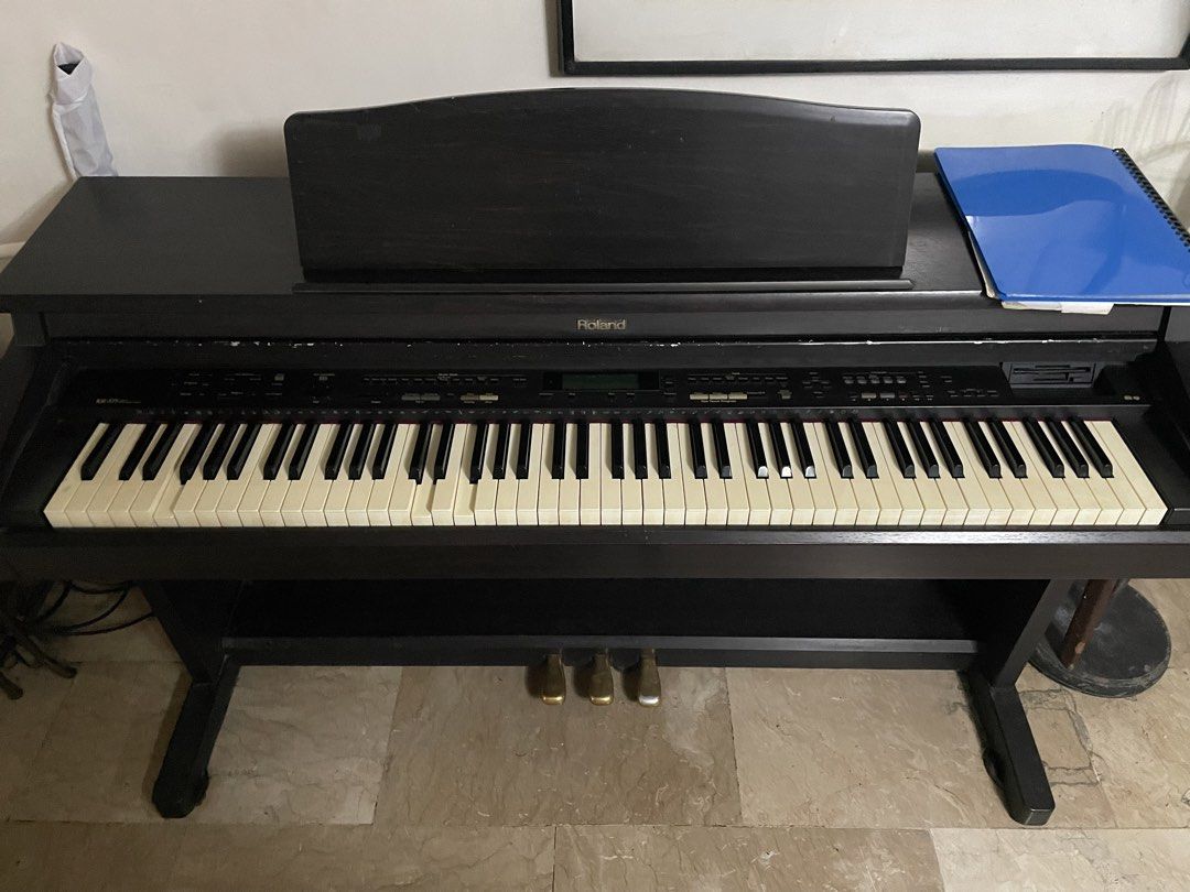 Roland KR-375 Digital Intelligent Piano (Category: Musical Instruments) located in Quezon City. Submitted by tommysm12 (Listing ID 1461333767, Image 1). Description: - Roland KR-776 digital piano - Built-in stand and music rest - Three pedals - Ideal for practice or performance - Minor cosmetic scuffs on casing - Only issue: Some keys need repair - Sold as is.