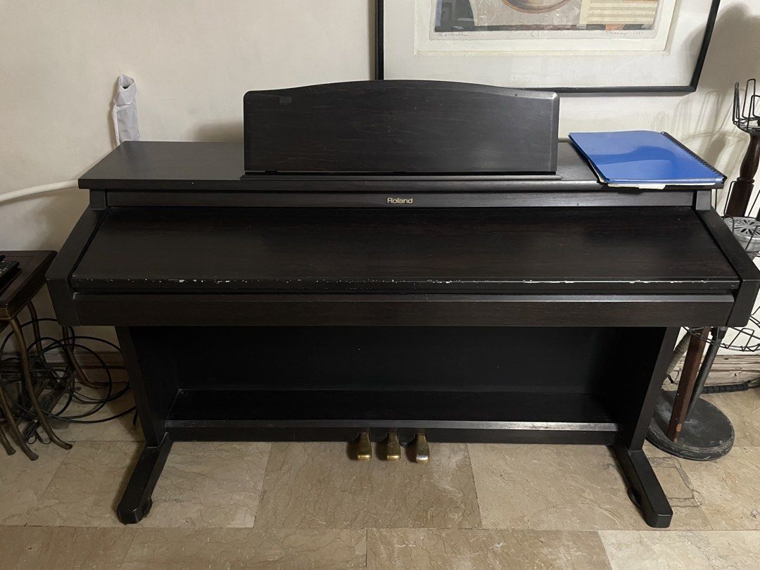 Roland KR-375 Digital Intelligent Piano (Category: Musical Instruments) located in Quezon City. Submitted by tommysm12 (Listing ID 1461333767, Image 3). Description: - Roland KR-776 digital piano - Built-in stand and music rest - Three pedals - Ideal for practice or performance - Minor cosmetic scuffs on casing - Only issue: Some keys need repair - Sold as is.