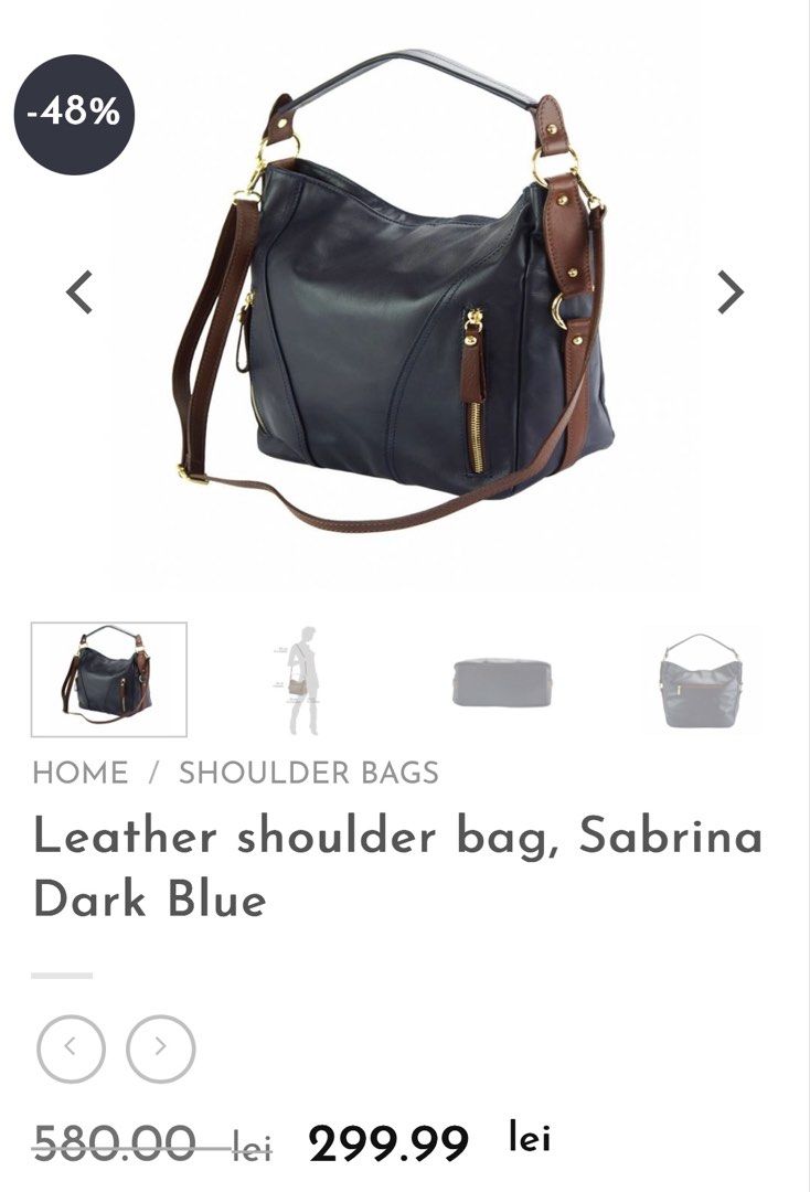 Sabrina Dark Blue Leather Shoulder Bag (Category: Shoulder Bags) located in Mandaluyong City. Submitted by TheWeekendProject (Listing ID 1461520426, Image 2). Description: - Stylish dark blue leather shoulder bag - Features elegant brown leather accents - Accented with shiny gold zippers - Can be worn as a shoulder bag or a crossbody (strap not included) - Offers ample interior space for your belongings - Ideal for everyday use and carrying your 