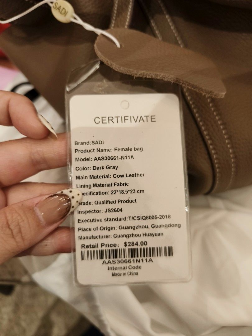 SADI bucket bag (Category: Luxury Bags & Wallets) located in Manila. Submitted by andengdj2 (Listing ID 1461429706, Image 2). Description: with bag scarf and horse keychain.