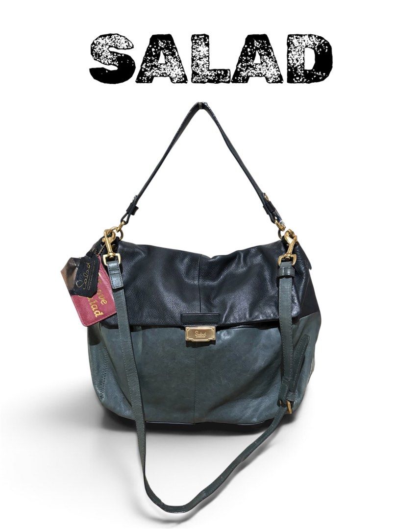 SALAD Leather Messenger Bag (Category: Shoulder Bags) located in Orani. Submitted by garage_poshbotique (Listing ID 1461425980, Image 2). Description: 𝓐𝓾𝓽𝓱𝓮𝓷𝓽𝓲𝓬 RABEANCO Black/Gray Messenger Bag Genuine Soft Leather Material: Soft leather with a nice sheen Features: Comes with original tags, ensuring authenticity.Spacious interior, lots of pockets and compartment, zip up pocket,two way straps /adjustable straps for comfort. Front flap cl
