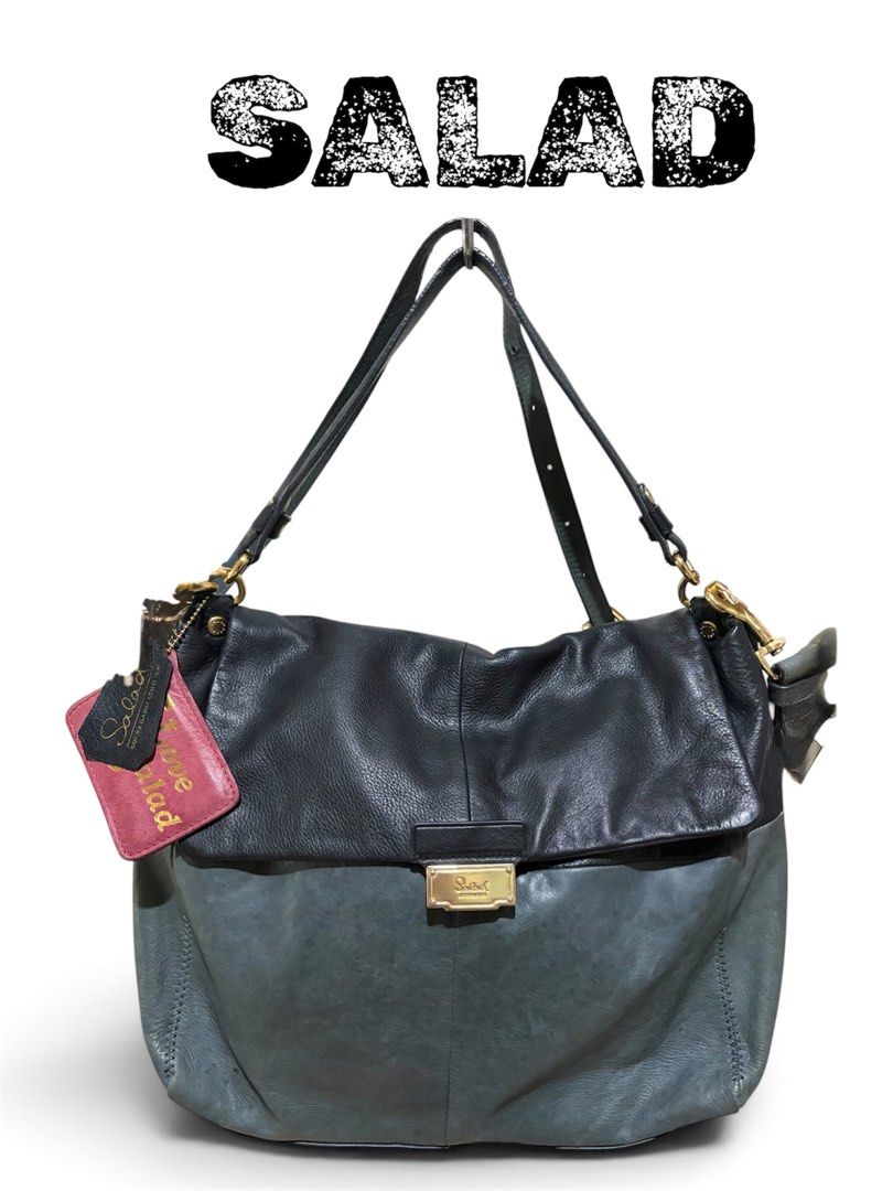 SALAD Leather Messenger Bag (Category: Shoulder Bags) located in Orani. Submitted by garage_poshbotique (Listing ID 1461425980, Image 1). Description: 𝓐𝓾𝓽𝓱𝓮𝓷𝓽𝓲𝓬 RABEANCO Black/Gray Messenger Bag Genuine Soft Leather Material: Soft leather with a nice sheen Features: Comes with original tags, ensuring authenticity.Spacious interior, lots of pockets and compartment, zip up pocket,two way straps /adjustable straps for comfort. Front flap cl