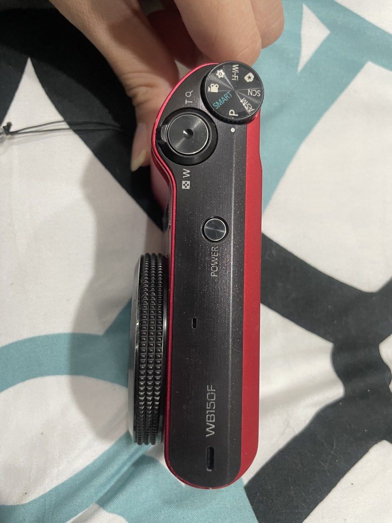 Samsung WB150F Red/Hot Pink Digital Camera (Category: Cameras) located in Caloocan City. Submitted by denaviz (Listing ID 1461533033, Image 2). Description: - Red/Hot Pink Samsung WB150F Digital Camera - 18x Optical Zoom - 24mm Wide-Angle Lens - 14.2 Megapixels - Minor cosmetic wear (stickers are removable, can remove upon request once paid) - Fully functional flash - Fully functional modes and buttons - Can video call to see the item once sure b