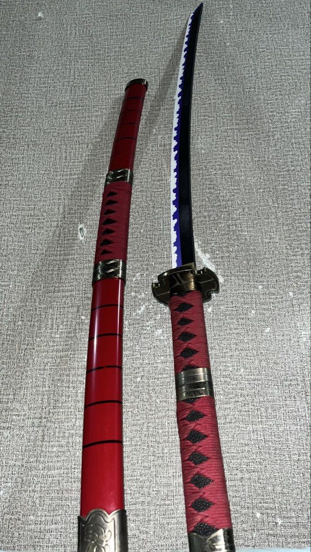 Sandai Kitetsu Replica Katana - One Piece (Category: Vintage Collectibles) located in Cavite. Submitted by gabrielsell.10 (Listing ID 1461474260, Image 1). Description: blunt blade made from wood good for cosplay or display 104cm or 41inches long (with scabbard) issue: paint chipping/fading on scabbard and blade meet up around imus (vermosa), bacoor (sm molino) or dasma (salawag) only.