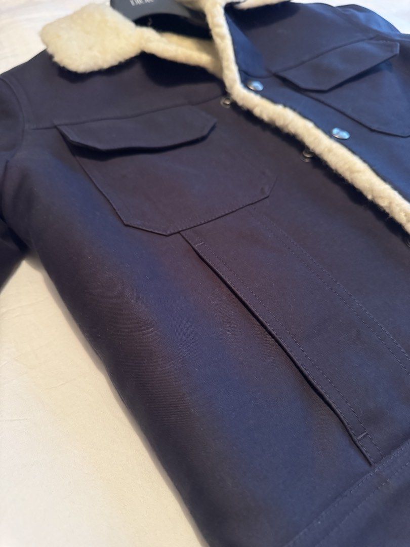 Sandro Paris Mens Shearling Aviator Jacket (Category: Luxury Apparel) located in Makati City. Submitted by quickbuysx (Listing ID 1461433470, Image 3). Description: Navy & Cream Sherpa Lined Jacket Excellent condition. No discoloration and well maintained. Shoulder 17” Chest 20” Length 26” Sleeve Length 24.5”.