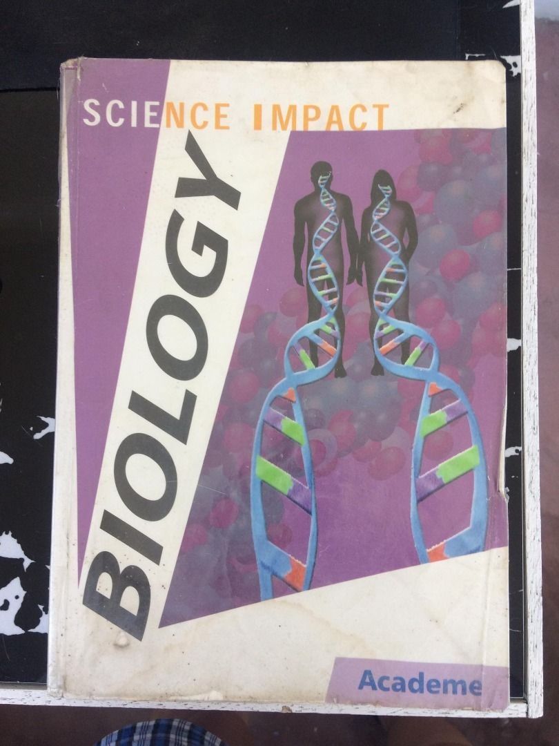 Science Impact Biology Textbook (Category: Textbooks) located in Naic. Submitted by cymelpochos (Listing ID 1461503995, Image 1). Description: - Science Impact Biology textbook - Features striking cover design with DNA strands and human silhouettes - Ideal for biology students - Shows some wear on cover and edges - Pages are intact and clean - A useful resource for your studies.