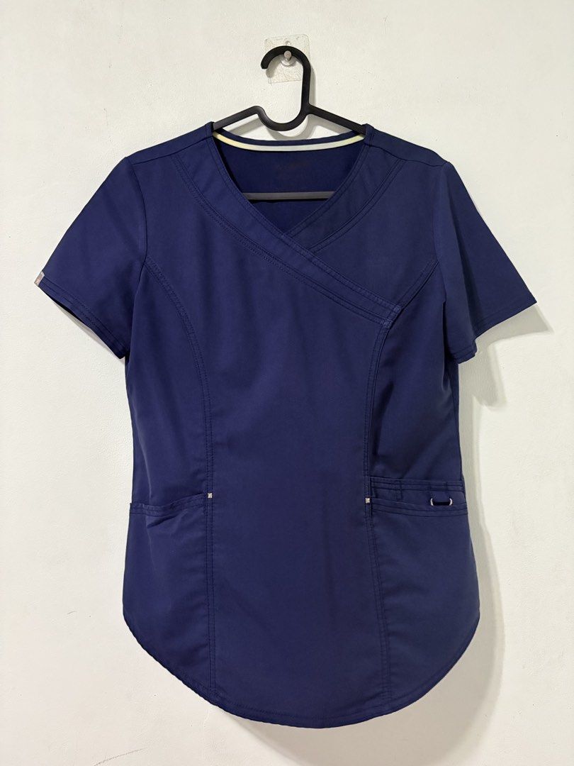 SCRUBSTAR SCRUB SET (Category: Sets or Coordinates) located in San Marcelino. Submitted by abyanggg (Listing ID 1461469028, Image 1). Description: Scrub star ultimate Navy blue Color rate 9.5/10 XS on tag (can fit S-M) Top:B38, S16, L26, 3 pockets, 1 ID holder Pants: W26-28, L38, 4 pockets cargo jogger Issue: small bleach stain sa may bottom part ng pants.