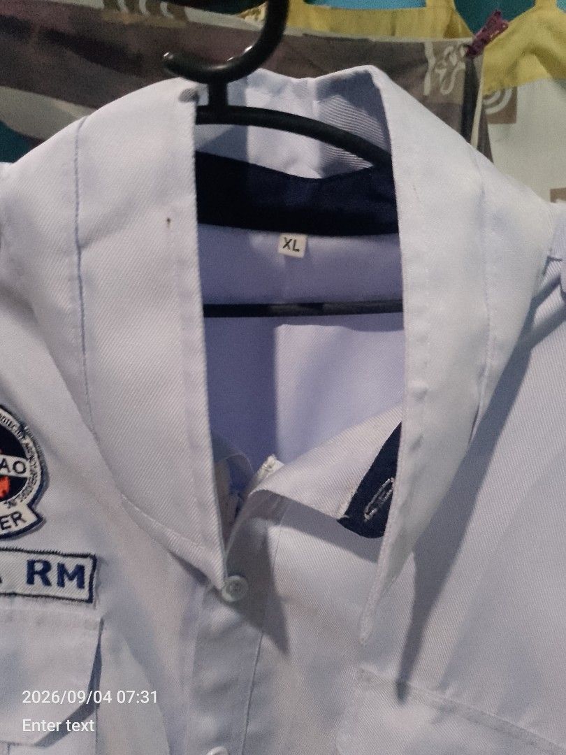 Security guard uniform typeA (Category: Tshirts & Polo Shirts ) located in Manila. Submitted by chollo24 (Listing ID 1461326619, Image 3). Description: -Security type A uniform with padpao and SOSIA - "GARCIA RM" embroidered on chest - Size: XL - Button-up front - Two chest pockets - security guard uniform .