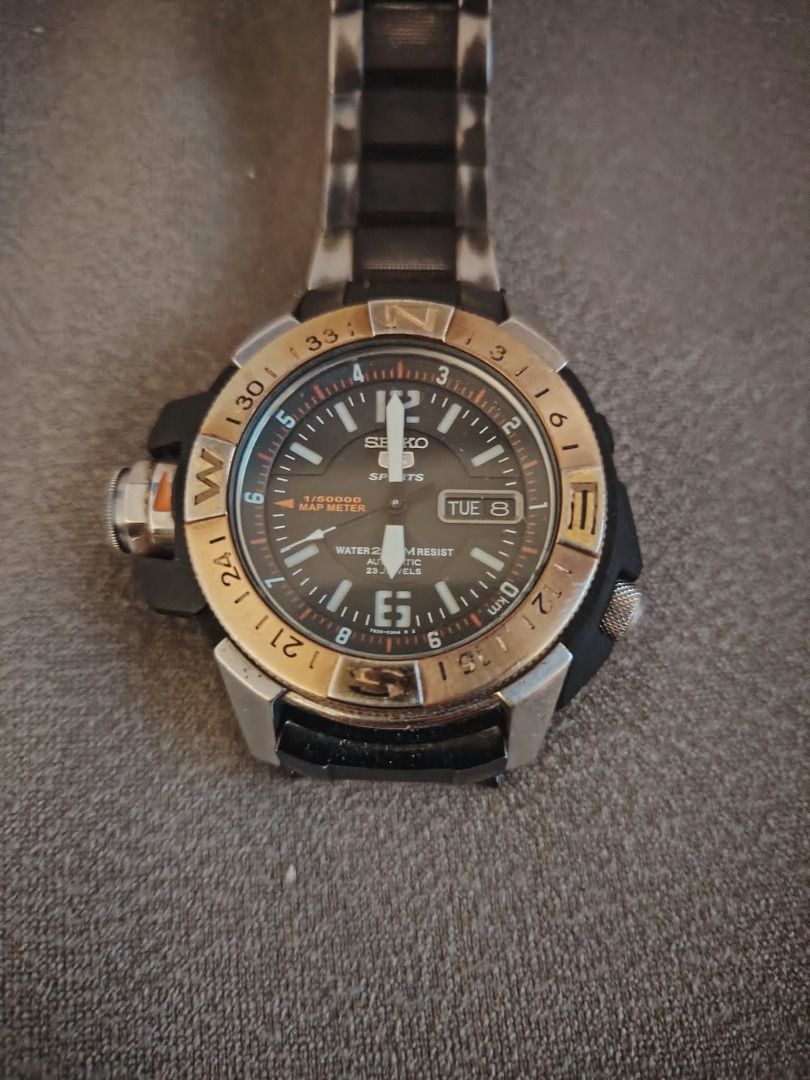 Seiko 5 Sports Map Meter (Category: Men's Watches) located in Cavite. Submitted by blackrain4 (Listing ID 1461558546, Image 1). Description: The Seiko 5 Sports Map Meter (often referred to by enthusiasts as the "Seiko Atlas" or "Land Shark") is a highly collectible, rugged tool watch designed for outdoor exploration. ## 📝 Product Description & Features The Map Meter stands out due to its heavy-duty, armored case design and unique analogue naviga