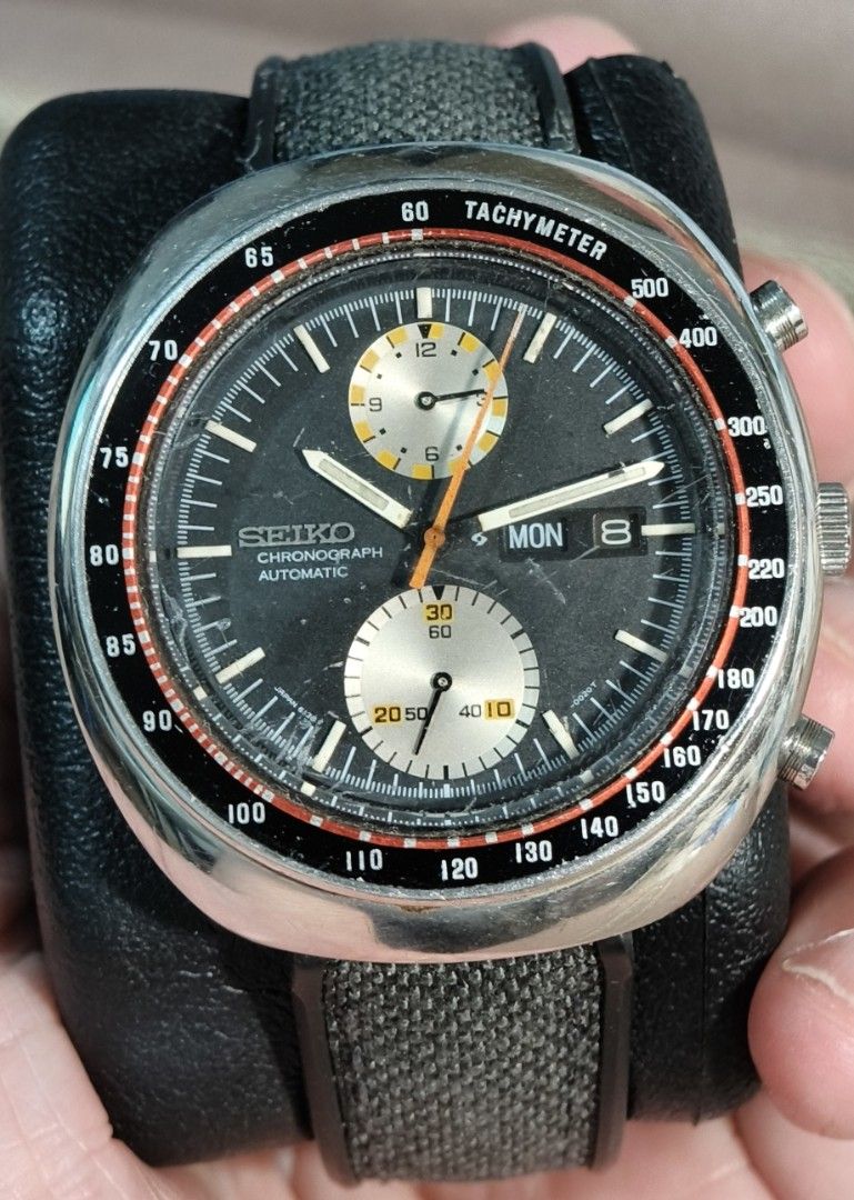 Vintage Seiko Speedtimer Automatic "UFO" Chronograph Tachymeter Watch (Category: Men's Watches) located in Quezon City. Submitted by jtgabs (Listing ID 1461444793, Image 2). Description: - 1970s Vintage "UFO" Seiko 6138 Automatic Chronograph Watch - March 1978 - Black dial with sub-dials - Tachymeter bezel - Day and date display - Striking orange accents on hands and markers - Comfortable Rubber strap -Original steel bracelet included - Aged well