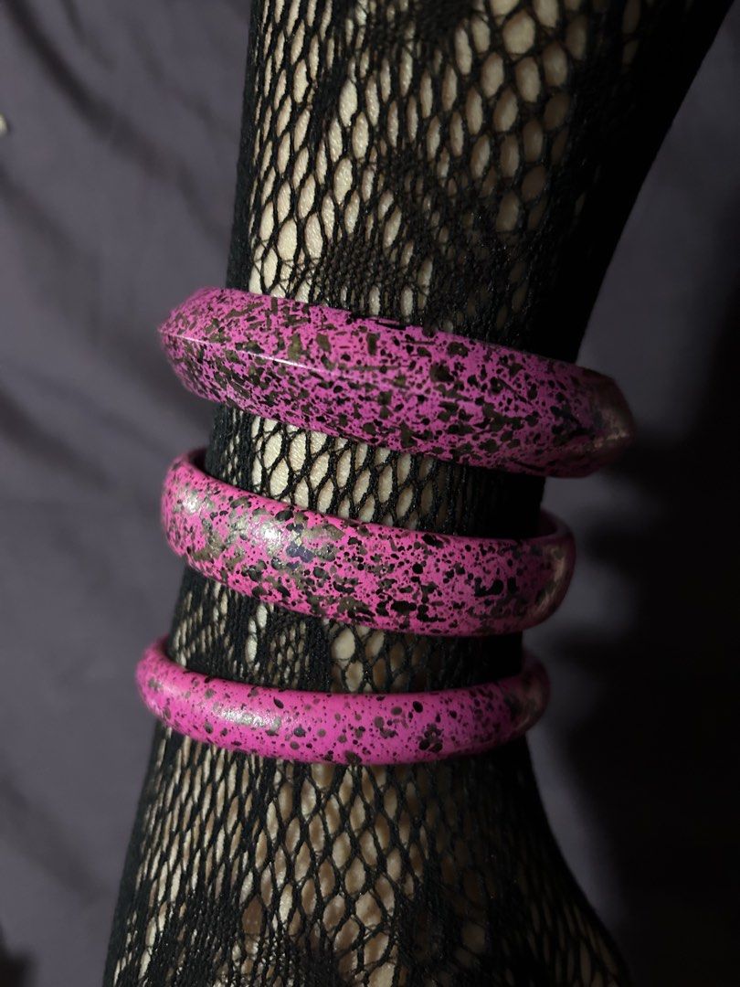 Set of 3 Pink Speckled Bangles (Category: Bracelets) located in Pasig City. Submitted by mixpicks (Listing ID 1461363638, Image 3). Description: - Set of 3 pink bangles - Black speckled pattern - Unique, textured finish - Fun statement pieces - Can be stacked or worn individually - Adds a pop of color to any outfit.