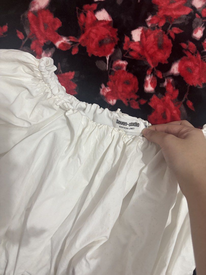 Seven Studio White Puff Sleeve Off-Shoulder Top (Category: Blouses) located in Cavite. Submitted by raf.nomnom (Listing ID 1461401648, Image 3). Description: - White puff sleeve top from Seven Studio - Off-shoulder design with elasticated neckline and hem - Short sleeves with gathered detail - Casual and chic style - Ideal for summer outfits.