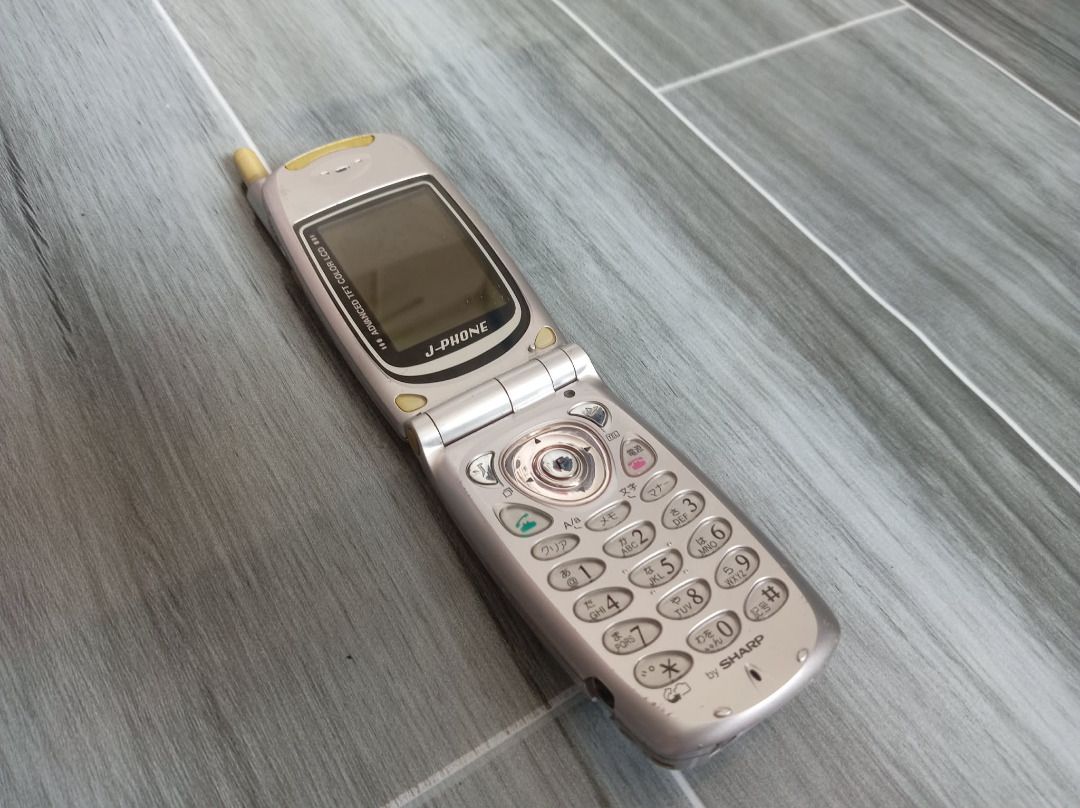 (RUSH SALE‼️)Sharp J Sh08 japanese flip phone (Category: Early Generation Mobile Phones) located in Moalboal. Submitted by josephjohn47897 (Listing ID 1461396212, Image 2). Description: Sharp J Sh08 flip phone with its original charger(price negotiable) hard to find locally issues:dead battery and signs of usage tho the light glows when charged the phone wont turn on, a dead battery based off my research sold as is this is meant for collectors or