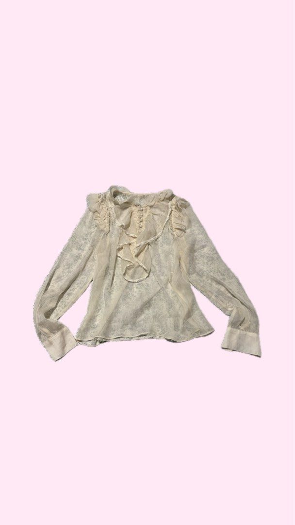 Sheer Ruffled Button-Up Blouse (Category: Blouses) located in Manila. Submitted by gojosbbgirl (Listing ID 1461439624, Image 1). Description: ❗️THRIFTED ITEM, please manage expectations. ❗️No WW all items. • Best fit XS-M • Cream sheer blouse • Delicate fabric. Please be careful when washing. • Very pretty ruffle details! ❗️FIXED PRICE ❗️PAYMENT FIRST via Gcash. ❗️DELIVERY via J&T only. No rush shipping!.