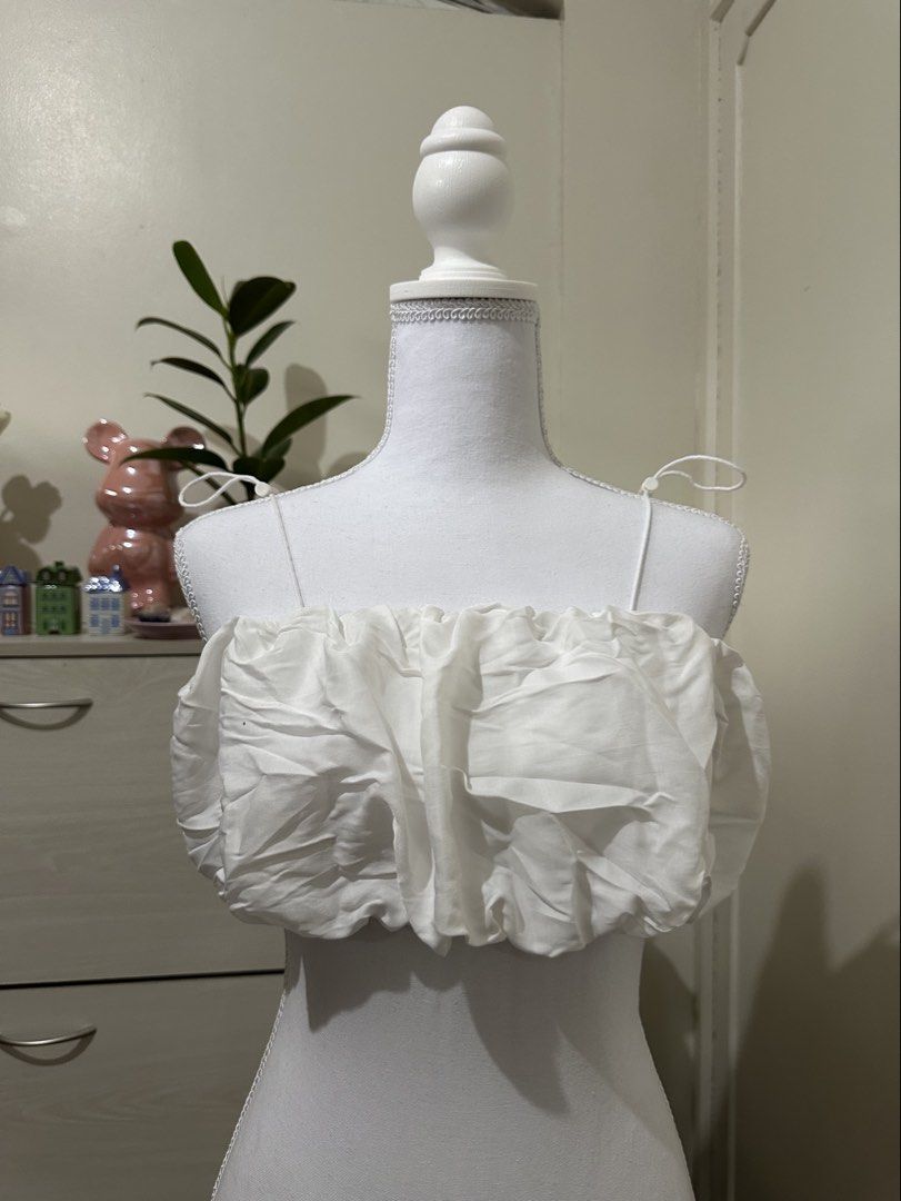 Shein White Ruffled Off-Shoulder Crop Top (Category: Others Tops) located in Antipolo. Submitted by wxyz9876 (Listing ID 1461497523, Image 2). Description: - Cute white ruffled crop top from Shein - Features trendy ruffled design - Adjustable tie straps for a perfect fit - Versatile: great for casual days or nights out - Fits sizes XS to M - Selling because it no longer fits.