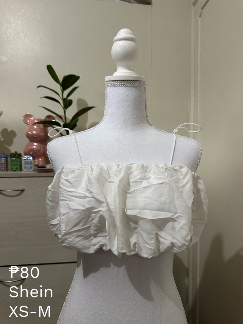 Shein White Ruffled Off-Shoulder Crop Top (Category: Others Tops) located in Antipolo. Submitted by wxyz9876 (Listing ID 1461497523, Image 1). Description: - Cute white ruffled crop top from Shein - Features trendy ruffled design - Adjustable tie straps for a perfect fit - Versatile: great for casual days or nights out - Fits sizes XS to M - Selling because it no longer fits.