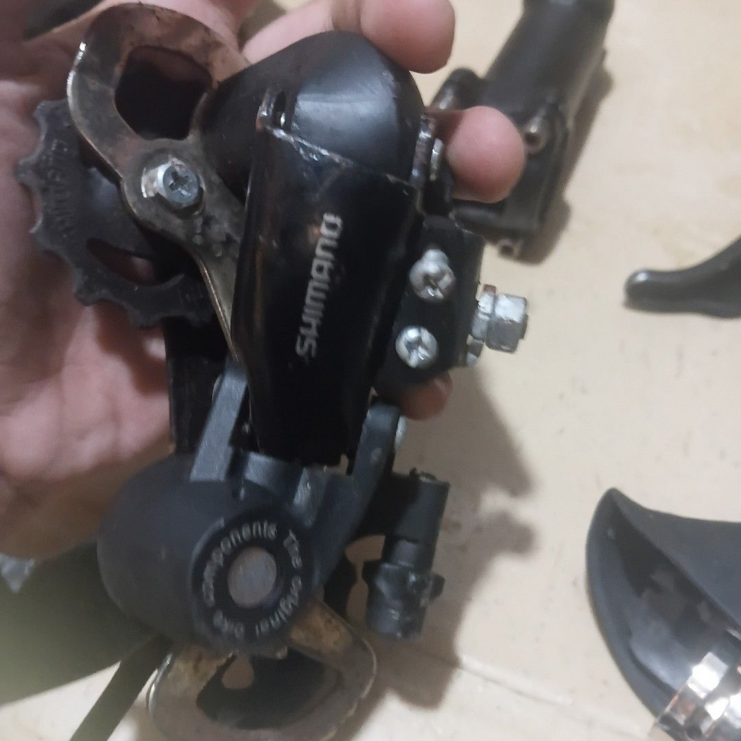 Shimano Bicycle Rear Derailleur (Category: Bicycles) located in Manila. Submitted by wise_jp (Listing ID 1461514711, Image 3). Description: - Genuine Shimano rear derailleur - Fully functional and working condition - Ideal for replacing a worn-out or damaged derailleur - Selling 'as is' - what you see is what you get.