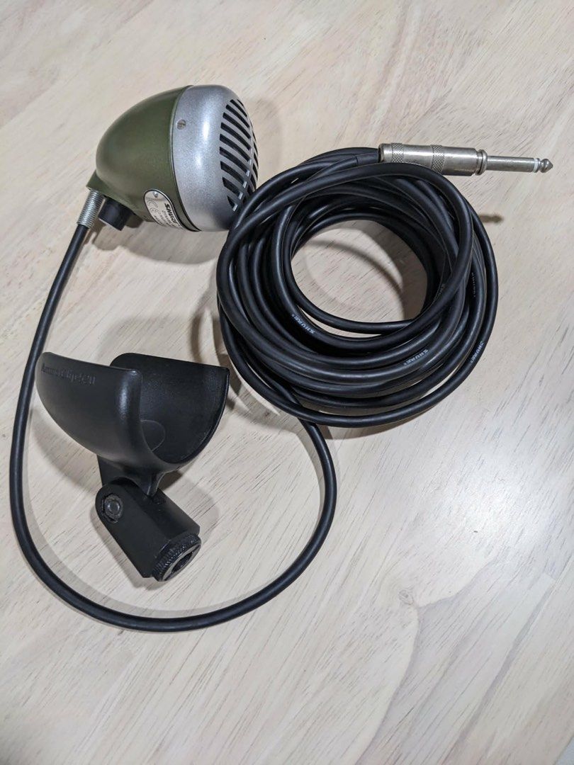 Shure 520DX Green Bullet Dynamic Harmonica Microphone (Category: Microphones) located in Taguig. Submitted by 128kilobyte (Listing ID 1461365316, Image 1). Description: Shure 520DX Green Bullet Dynamic Harmonica Microphone Fully functional Minimal scuffs Coiled cable with 1/4" With Free Ammo Clip 520 mic holder Last price .