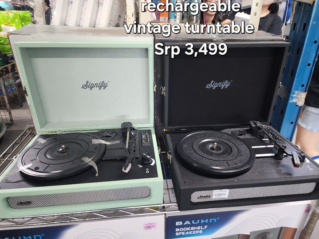 Signify Rechargeable Vintage Turntable (Category: Portable Music Players) located in Cainta. Submitted by christine07. (Listing ID 1461324414, Image 1). Description: - Signify rechargeable vintage turntable - Available in mint green and black - Ideal for playing vinyl records - Built-in speakers for easy listening - Original SRP: P3,499 - Feel free to ask any questions!.
