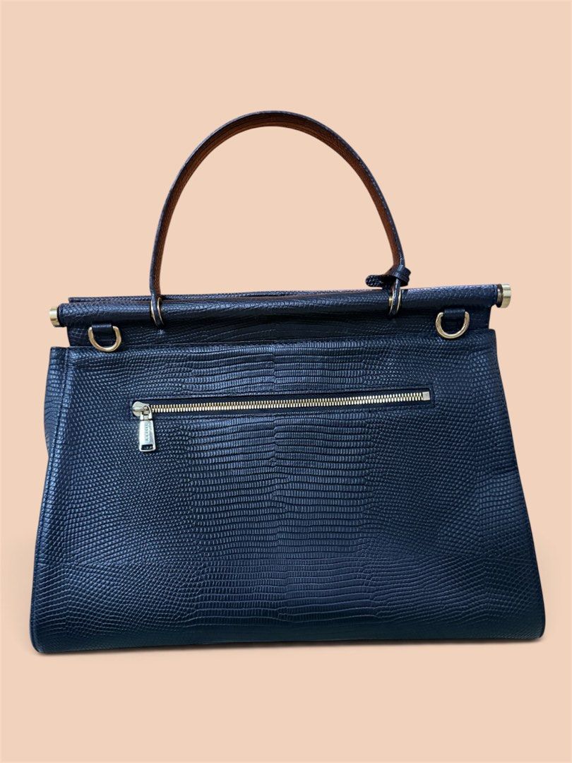 SISLEY Black Lizard Embossed Leather Top Handle Bag (Category: Luxury Bags & Wallets) located in Lapu Lapu. Submitted by warmwhale.be136e (Listing ID 1461559080, Image 2). Description: - Black leather handbag with elegant lizard embossed texture. - Features a sturdy top handle for comfortable carrying. - Secure turn-lock closure to keep your belongings safe. - Convenient zippered pocket on the back for quick access. - Multiple interior compartmen