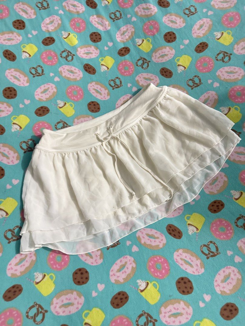 SKORT (Category: Skirts) located in Quezon City. Submitted by patty_3. (Listing ID 1461336210, Image 2). Description: - Cute white mini skirt - Layered chiffon design - Drawstring waist for adjustable fit - Versatile for casual days or nights out.