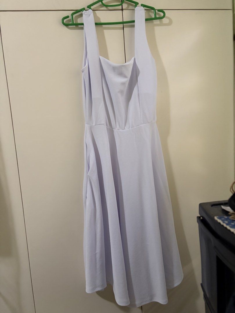 Sleeveless A-line Midi Dress (Category: Dresses) located in San Fernando. Submitted by shabelifer (Listing ID 1461458607, Image 1). Description: - Sleeveless design - Flattering square neckline - A-line midi skirt - Convenient side pockets - Subtle textured fabric for added detail - Versatile for casual or dressy looks - Extra large .
