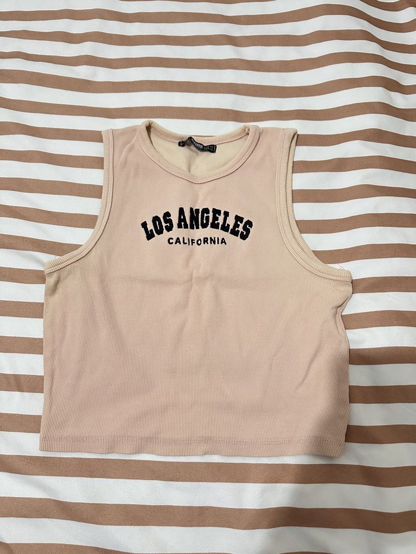 Sleeveless Crop Top (Category: Sleeveless) located in Valenzuela. Submitted by shopbychacha (Listing ID 1461391390, Image 1). Description: Sleeveless Crop Top Can fit from XS to S.