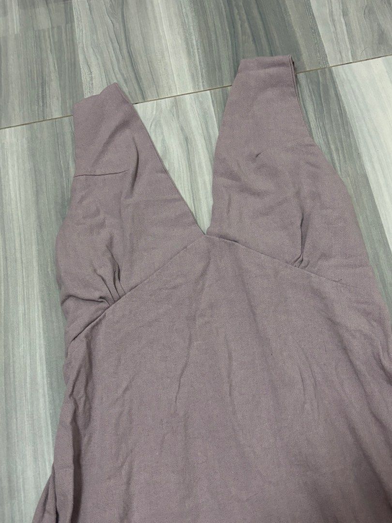 Smocked V-Neck Mini Dress (Category: Dresses) located in Manila. Submitted by lovedbynabix (Listing ID 1461446074, Image 2). Description: Cute purple mini dress. Has a smocked bodice with a V-neckline. Straps are gathered. Great for casual wear or dressing up..